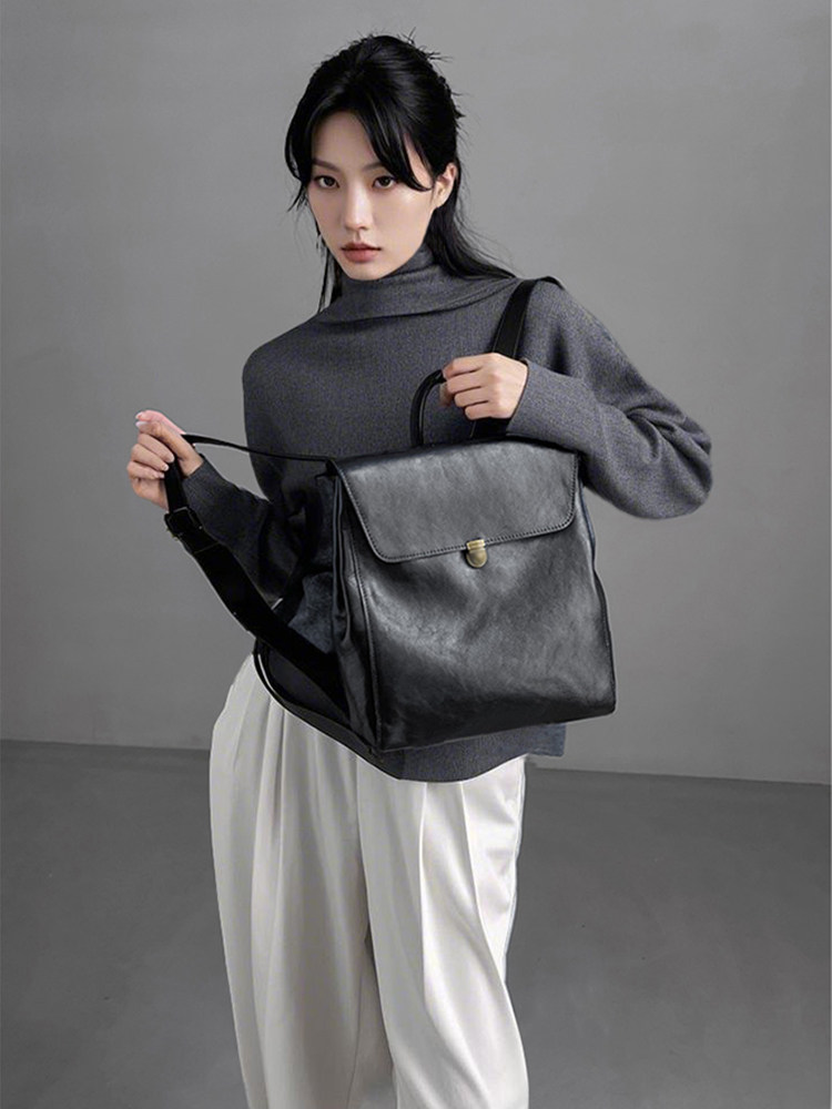 Luxe merkrugzak van echt leer  - Luxury Bags For Women Brands recensie en prijs